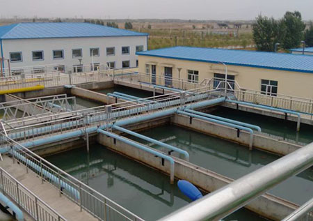 How is industrial wastewater treated?